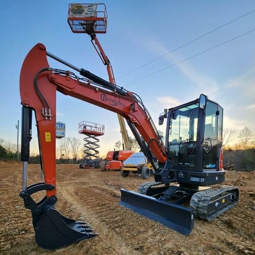 Construction site with excavators and lift equipment.